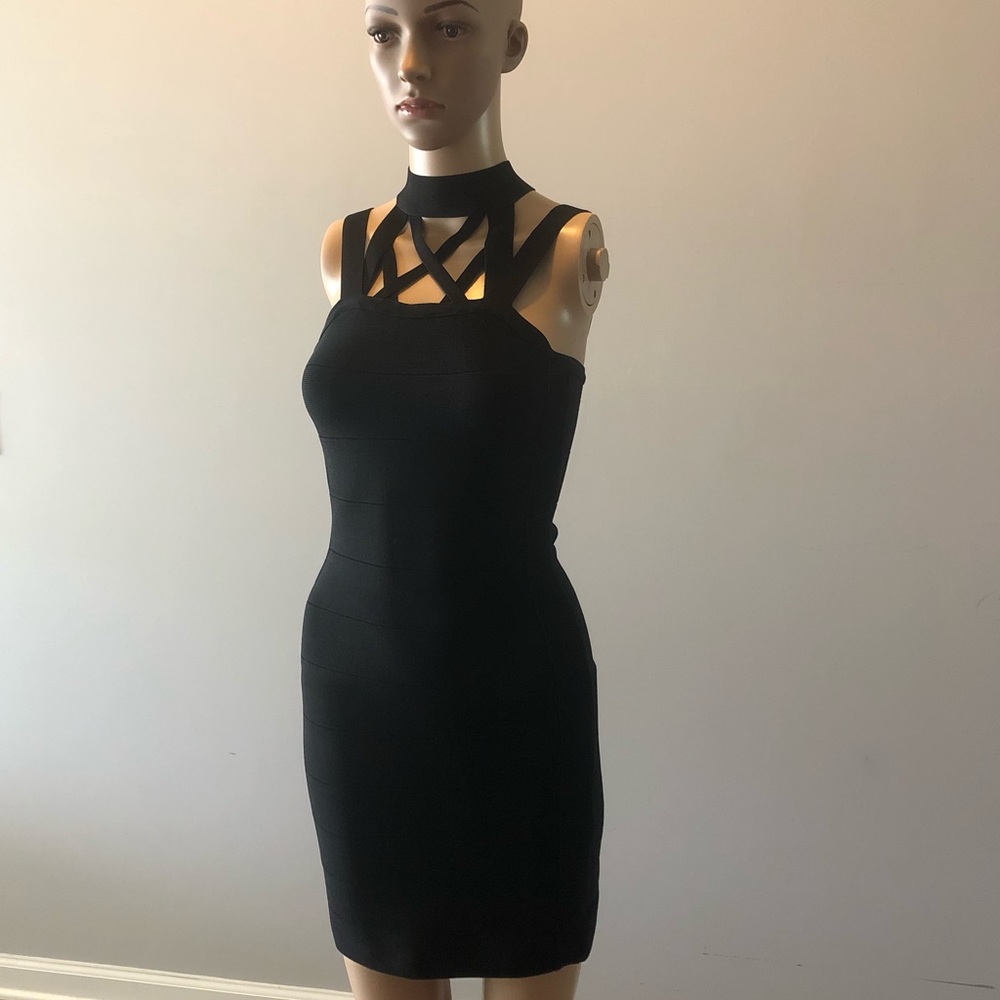 Strappy black bebe dress